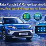 Blue Tata Punch EV charging at an EV station with headline text about range, battery, real-world mileage